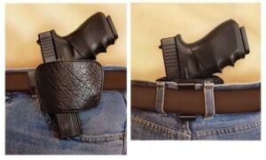 Concealed handgun holster in jeans waistband.