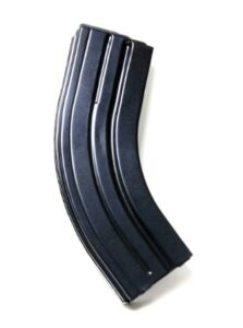 Curved rifle magazine on white background