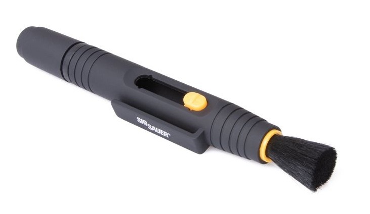 Lens cleaner pen with brush and retractable design