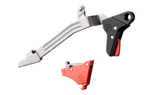 Firearm trigger mechanism and related components on display.