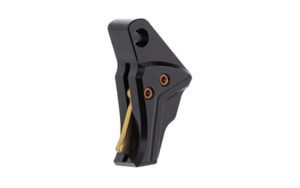 Black and gold metal mechanical component, triangular shape.