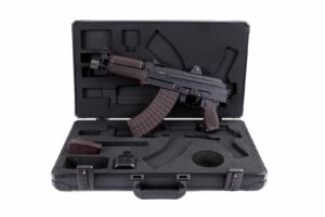 Tactical firearm in a protective carrying case.