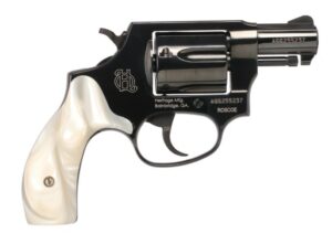 Black revolver with pearl handle grip
