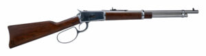Lever-action rifle with wood stock and metal barrel.