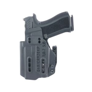 Holstered handgun with tactical light attachment