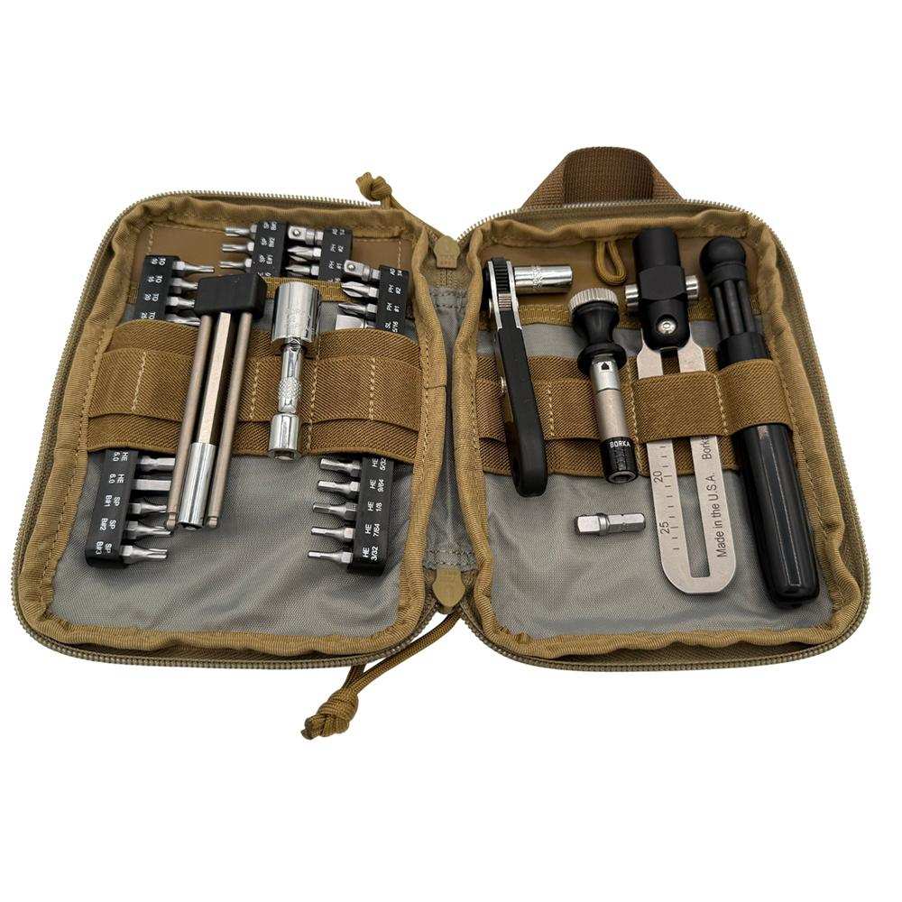 Compact toolkit with various screwdriver bits.