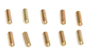 Ten brass round spacers on white background.