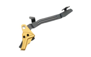 Gold and black metal trigger component