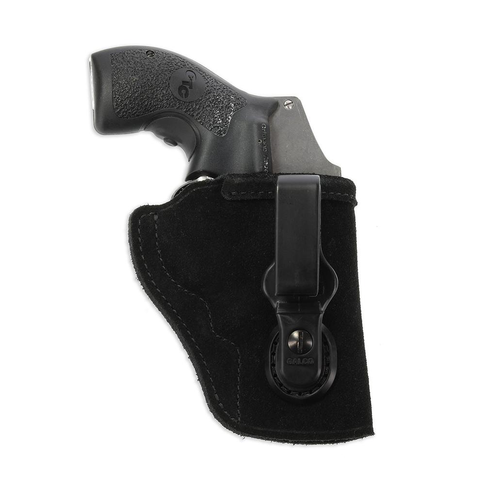 Revolver in black suede holster with belt clip.