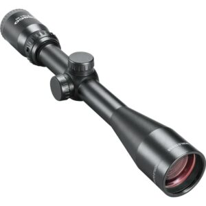 Black riflescope with adjustment knobs side view.