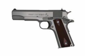 Silver handgun with brown grip, side view.