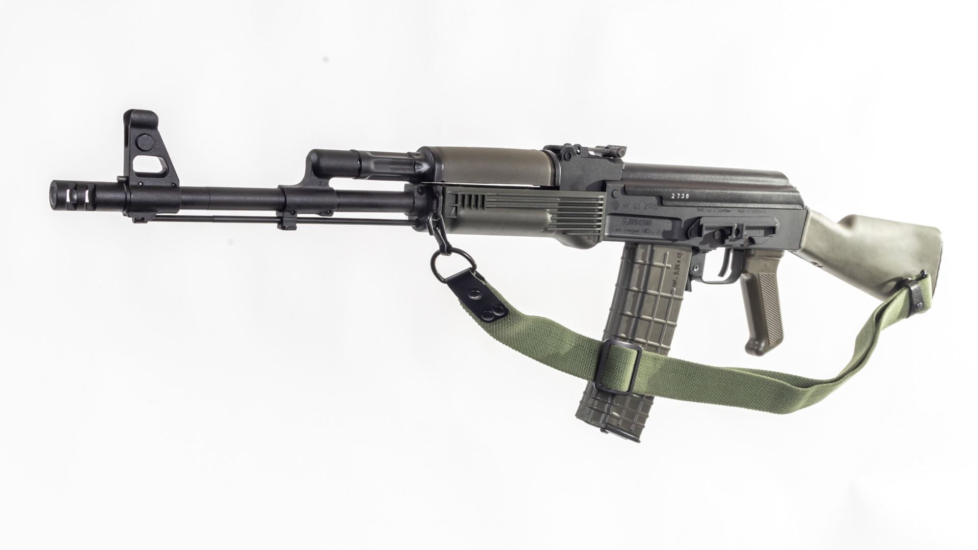 Rifle with sling on white background.