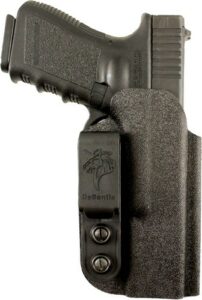 Handgun in holster on white background