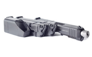 Semi-automatic pistol with mounted accessory and extended magazine