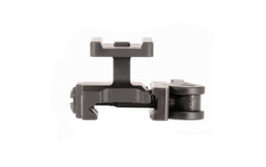 Machined metal bracket with small roller wheel