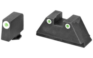 Black handgun front and rear sights with green dots