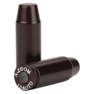 Two dark handgun cartridges on white background