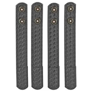 Four black tire protector strips with brass grommets.