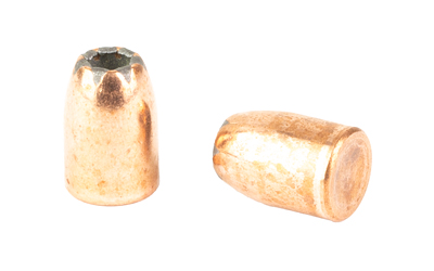 Two copper hollow-point bullets on white background