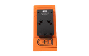 Black plug adapter on bright orange base