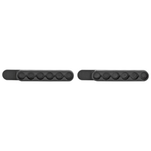 Two black molded grip pads for bicycles.