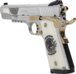 Silver and gold engraved handgun with white grip.