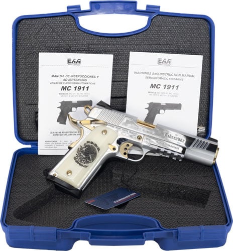 Silver pistol in case with manuals.
