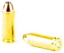 Two gold bullet casings on white background