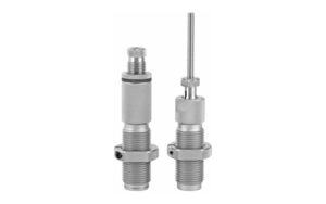 Two metal reloading dies on white background
