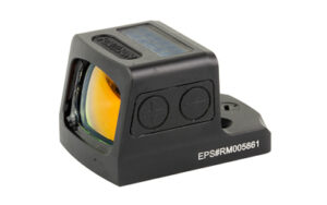 Compact red dot sight optic on white background