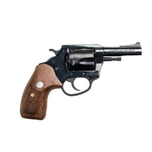 Black revolver with wooden grip on white background.