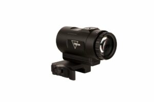 Black firearm scope with mounting bracket.