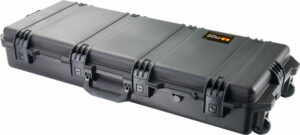 Long black hard-shell protective equipment case with wheels