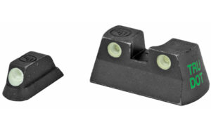 Black pistol night sights with green dots