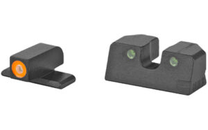 Black handgun iron sights with green dots