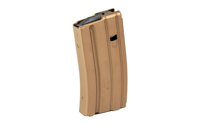 Tan rifle magazine standing upright, isolated view.