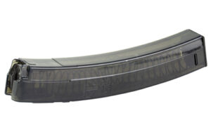 Clear rifle magazine on white background