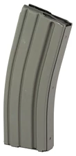 Rifle magazine, metallic and curved, isolated view.