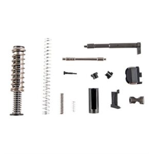 Handgun parts kit with springs and components.