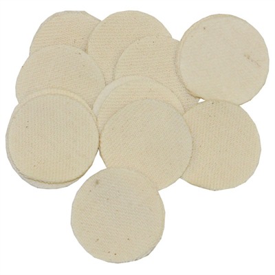 Round cotton cleaning pads piled together.