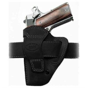 Black leather gun holster with a pistol inside.