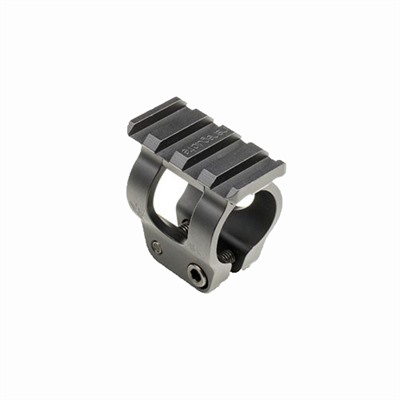 Tactical rifle scope mount with rail attachment.
