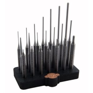 Set of metal punch tools on stand