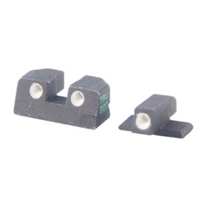 Handgun night sights with glowing dots.