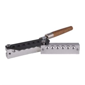 Bullet mold with wooden handle on white background.