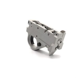 Silver rifle trigger mechanism assembly piece.