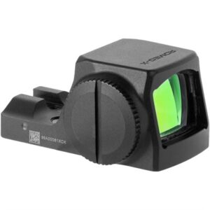Black reflex sight with green lens, side view.