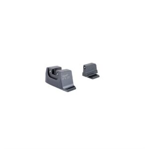 Compact iron gun sights on white background.