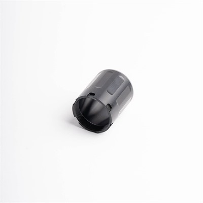 Black plastic cylindrical object on white background