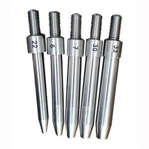 Five silver metallic alignment pins with numbers.